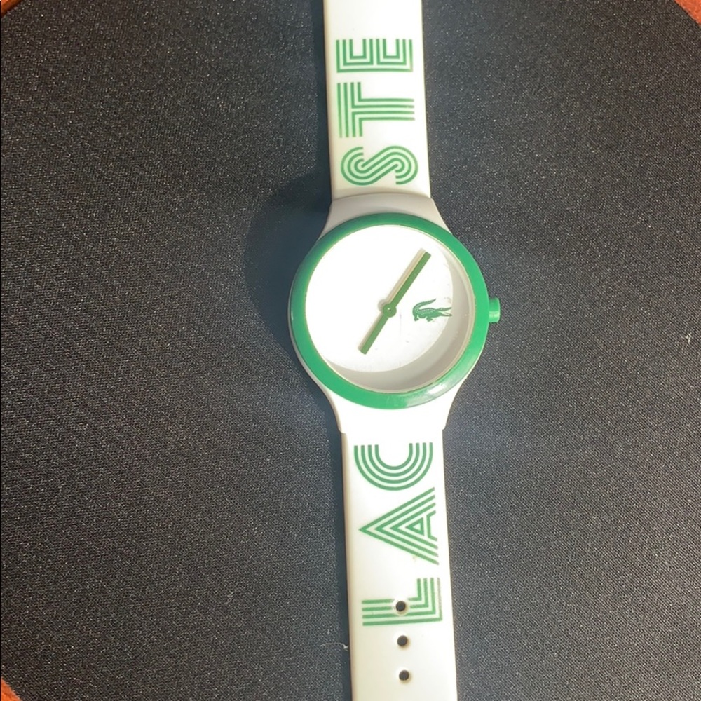 Pearl white Lacoste watch.